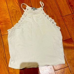 White long crop top. With flower detail.